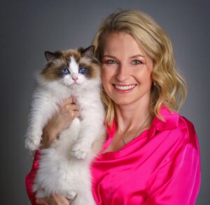 Headshot of Petra Cerna with her cat
